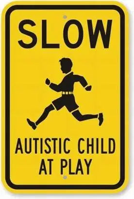 Autistic Child At Play